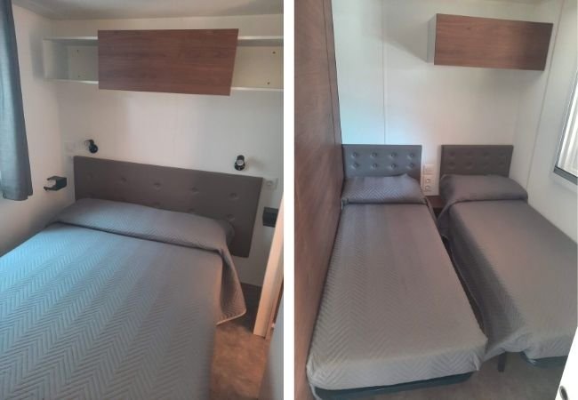 Camera con letto matrimoniale e un'altra con due letti singoli, arredamento semplice.
